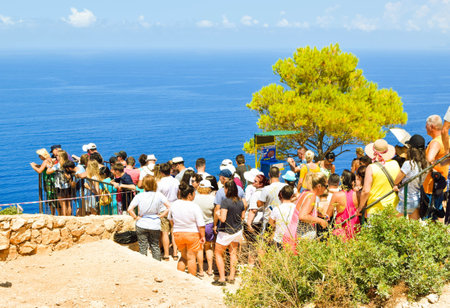 Shipwreck Bay, Zakynthos Island, Greece - July 26, 2017: The queue of tourists on the observation...