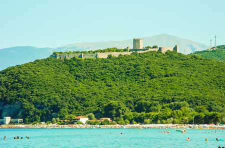 Paralia Skotinas, Greece - July 29, 2017: Vacationers on the beach on a summer sunny day.のeditorial素材