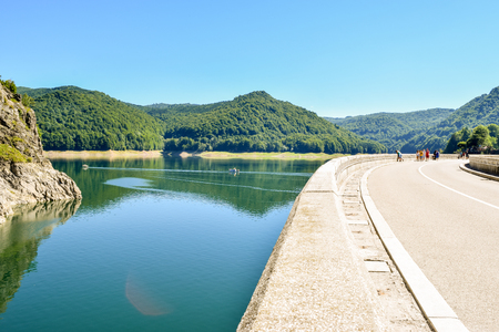Transfagaras road, Romania, - August 3, 2017: Tourists near the dam and lake Vidradu.のeditorial素材