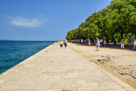 Zadar, Croatia - July 6, 2018: Tourists on the waterfront of Zadar.のeditorial素材