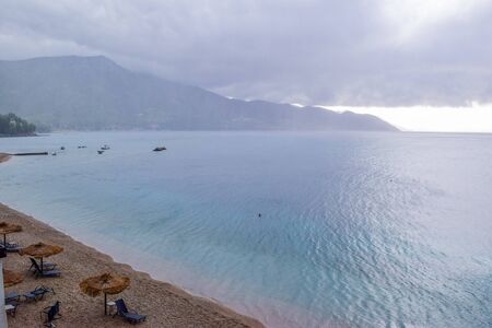 Rainfall over the sea. OrebiÄ, Croatia.の写真素材