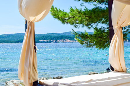 Beach bed with canopy. Orebic, Croatia,