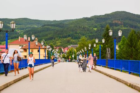 Visegrad, Bosnia and Herzegovina - July 27, 2018: Passers-by on the bridge over the Drina River.のeditorial素材