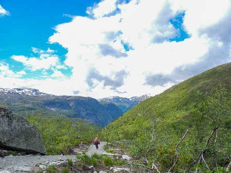 The tourist starting to climb the Trolltunga, Norway.の写真素材