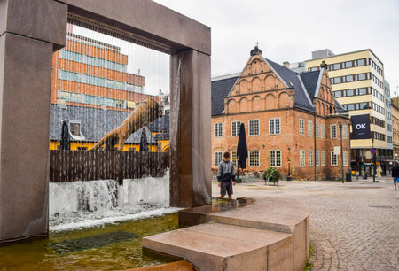Oslo, Norway - June 16, 2019: Christin IV's Glove Statue is located in the center of the fountain.