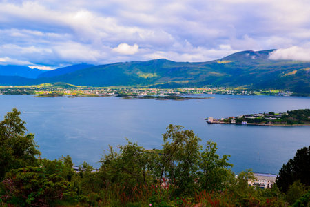 Aspoy Island view from Aksla viewpoint. The amazing sunset over Alesund cityscape. The municipality...