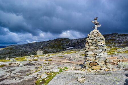 Trail to Kjeragbolten. Landscapes of the Norwegian mountains, where the famous boulder stuck at an altitude of 984 meters above Lysefjorden on Mount Kjerag, Norwayの写真素材