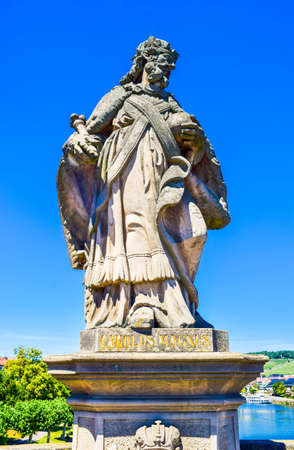 Wurzburg, Germany - July 4, 2019: Statues of Carolus Magnus on the Old Main Bridge. Summer cityscape. Wurzburg is a city located on Main River. Franconia, northern Bavaria, Germany.のeditorial素材