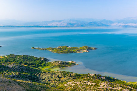 Shtegvashe Viewpoint. Beautiful summer landscape of small green islands and blue waters of Lake...
