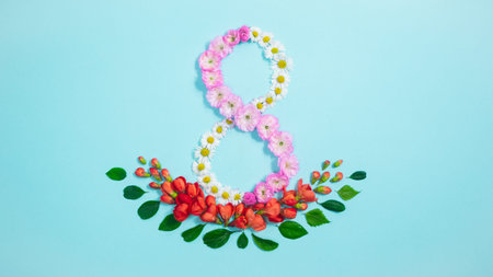 Greeting card for Women's Day on March 8, made from fresh natural flower white, pink and red buds...