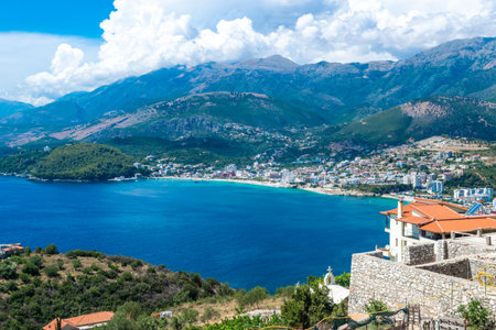 Panoramic view from the top on the resort Himare town. Beautiful summer cloud mountain landscape. Ionian sea. Albania.の写真素材