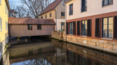 Facades of old historic houses located near the Gera River in the Thuringian capital Erfurt. Old Town. Germany.の写真素材