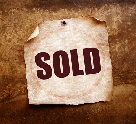 Sold word on old paperの写真素材