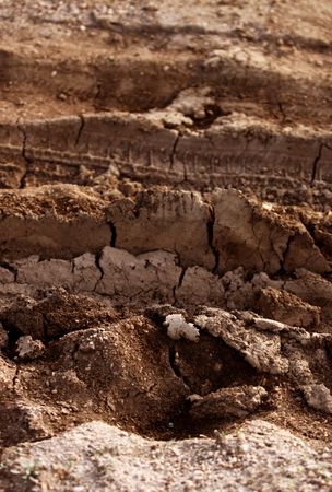 Dirt background with vehicle pattern trackの写真素材