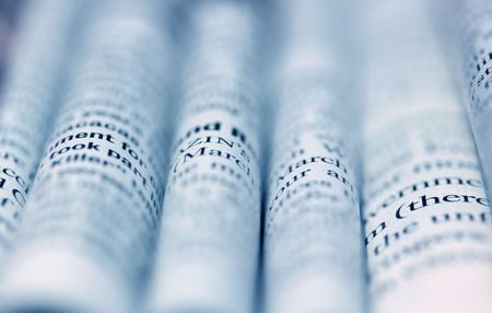 Close up of newspaper with headlinesの写真素材