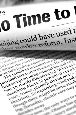 Close up of newspaper with headlinesの写真素材