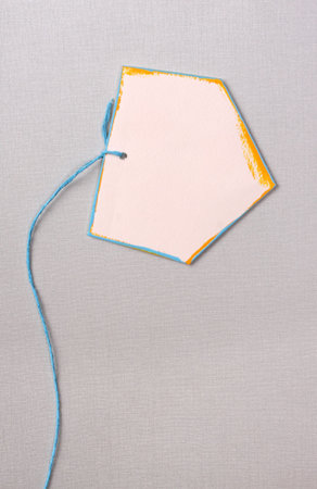Close up of handmade paper tag for background