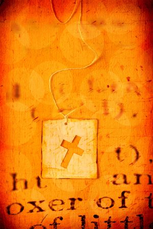 Close up of handmade paper tag with holy crossの写真素材