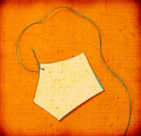 Close up of handmade paper tag for backgroundの写真素材