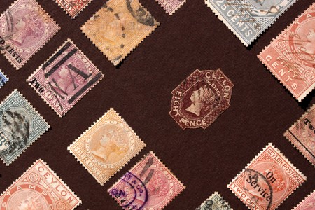 Close up of ancient old postal stampsの写真素材