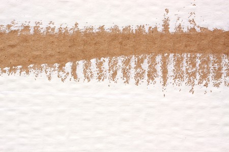 Close up of cardboard with brush linesの写真素材