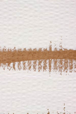 Close up of cardboard with brush linesの写真素材