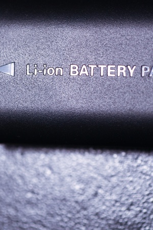 Close up of rechargeable lithium-ion battery for digital cameraの写真素材