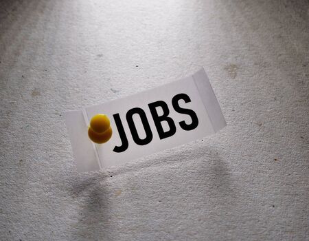 Close up of a jobs label tagの写真素材