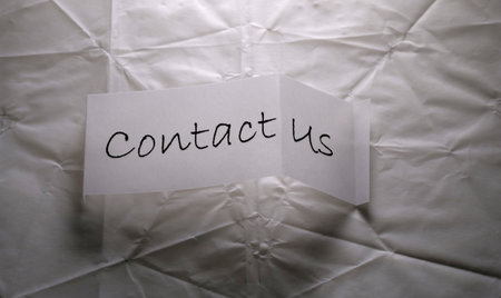 Close up of contact us tag