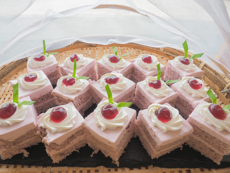 Blueberry small square cake for coffee brake.の写真素材