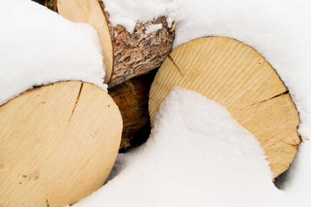 Close up of a pile of pine logs for winter firewoodの写真素材