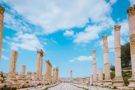 Ancient archaeological site of Jerash in Jordan, roman ruins, travel, columns, sky and cloudsのeditorial素材