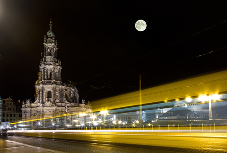Dresden Cathedral & yellow tramの写真素材