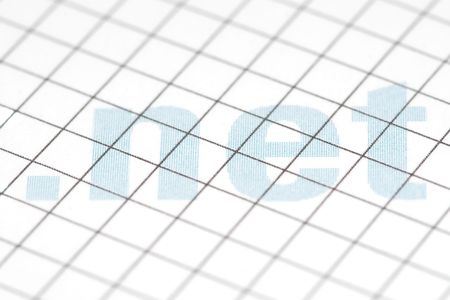 Picture of blue dotted '.net' on white paper with black linesの写真素材