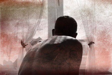 The man at the windowの写真素材