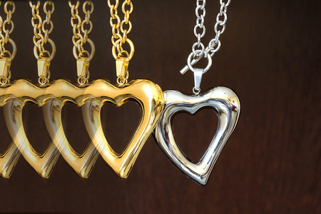 Gold and silver heart. Necklace stainless surgical steel.の写真素材