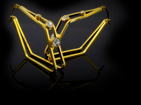 Earrings - Jewelry on a black background - Steelの写真素材