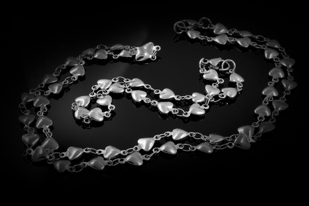 Set necklace and bracelet - Jewelry on a black background - Stainless Steelの写真素材