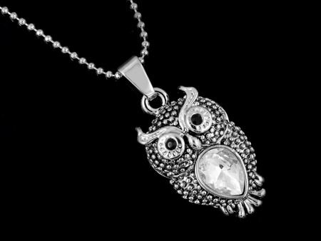 Owl pendant - silver and cubic zirconia - Black backgroundの写真素材