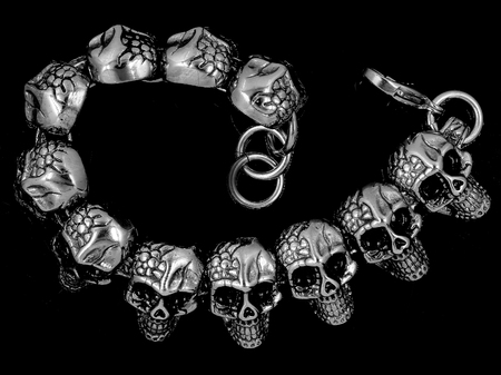 Jewelry bracelet for men. Skulls, crosses and classic. Stainless steel. One color backgroundの写真素材