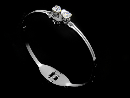 Jewelry silver bracelet. Stainless steel. One color backgroundの写真素材