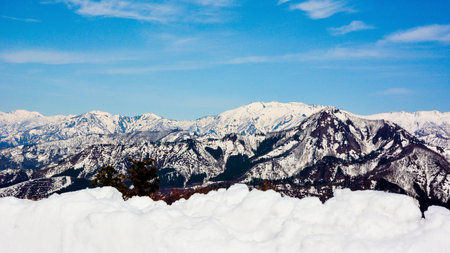 Snow capped mountains with blue sky in sunny day.Yuzawa,Niigata,Japan