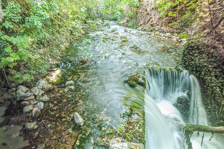 Wonderful waterfall in famous "Riofrio". Long exposure. Granada. Spain.の写真素材