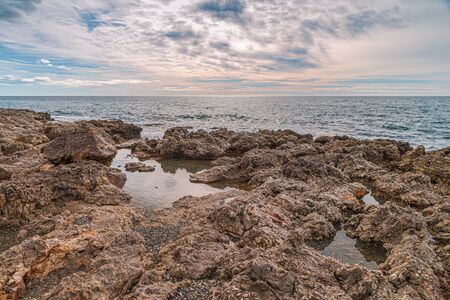 Mediterranean Coast Stones next to "Torre Vigia Las Palomas" in MÃ¡laga. Costa del Sol. Spain.の写真素材
