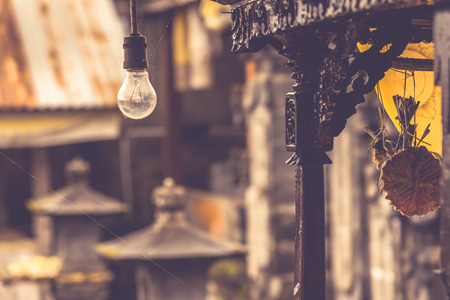Light bulb in balinese temple.の写真素材