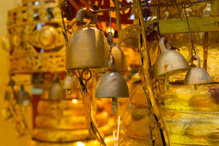 Old gold bell in buddhist temple.の写真素材