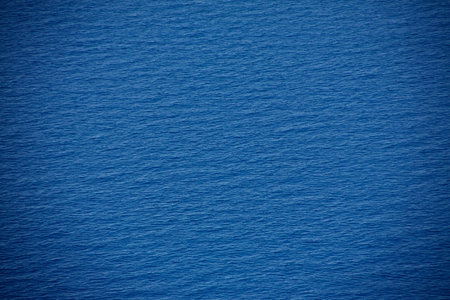 Bird's-eye view of the open sea from a cliff