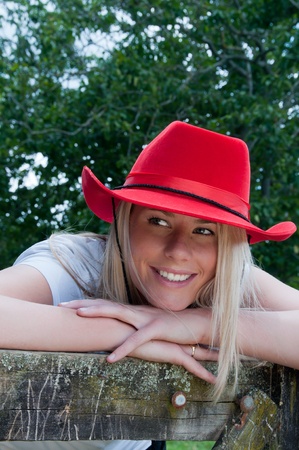 Cowgirl in red stetson hatの写真素材