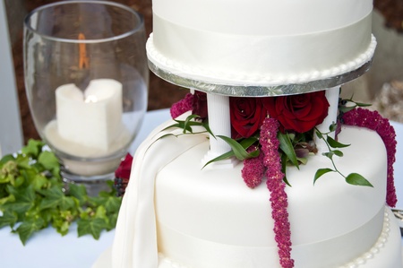 Wedding cake and remembrance candleの写真素材