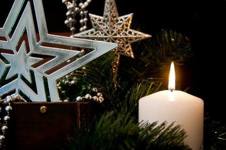 Candle and christmas starsの写真素材